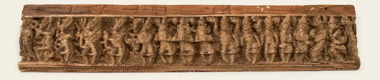 Large South Indian frieze carved with numerous Hindu figures, presented horizontally on an ivory background